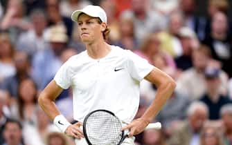 Jannik Sinner looks dejected during the opening set of the Gentlemen's Singles semi-final match against Novak Djokovic on day twelve of the 2023 Wimbledon Championships at the All England Lawn Tennis and Croquet Club in Wimbledon. Picture date: Friday July 14, 2023.