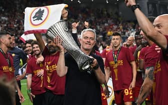 Roma's Portuguese head coach Jose Mourinho celebrates with the trophy after his team won the UEFA Europa Conference League final football match between AS Roma and Feyenoord at the Air Albania Stadium in Tirana on May 25, 2022. (Photo by OZAN KOSE / AFP) (Photo by OZAN KOSE/AFP via Getty Images)
