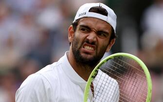 epa10738307 Matteo Berrettini of Italy reacts as he plays Carlos Alcaraz of Spain in their Men's Singles 4th round match against at the Wimbledon Championships, Wimbledon, Britain, 10 July 2023.  EPA/NEIL HALL   EDITORIAL USE ONLY