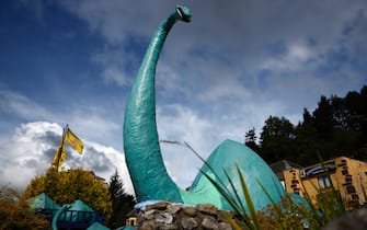 DRUMNADROCHIT, SCOTLAND - AUGUST 25: A model is seen near Loch Ness ahead of what is being described as the biggest search for the Loch Ness Monster since the early 1970s being held this weekend on August 25, 2023 in Drumnadrochit, Scotland. Hundreds of Nessie enthusiasts are gearing up to take part in the biggest organised hunt for the mysterious creature in 50 years. (Photo by Jeff J Mitchell/Getty Images)