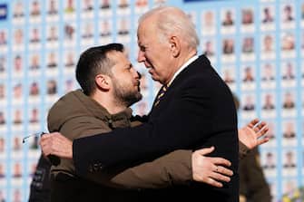 US President Joe Biden (R) is greeted by Ukrainian President Volodymyr Zelensky (L) during a visit in Kyiv on February 20, 2023. - US President Joe Biden made a surprise trip to Kyiv on February 20, 2023, ahead of the first anniversary of Russia's invasion of Ukraine, AFP journalists saw. Biden met Ukrainian President Volodymyr Zelensky in the Ukrainian capital on his first visit to the country since the start of the conflict. (Photo by Dimitar DILKOFF / AFP)