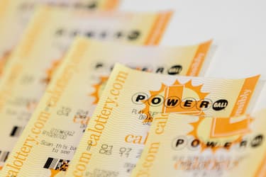 epa10914148 Powerball tickets are photographed in Los Angeles, California, USA, 11 October 2023. With an estimated 1.73 billion dollars jackpot, this is the second largest prize in the Powerball game s history.  EPA/ETIENNE LAURENT