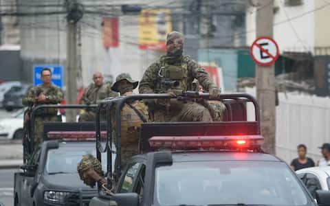 RIO DE JANEIRO, BRAZIL  OCTOBER 28: Security forces take measures following a large-scale police operation targeting the Comando Vermelho (CV) gang in the Alemao and Penha complexes in the northern zone of Rio de Janeiro, Brazil, on October 28, 2025. Authorities report that at least 64 people  including four police officers  were killed and 81 suspects were detained, marking the deadliest operation in the state's history. (Photo by Fabio Teixeira/Anadolu via Getty Images)