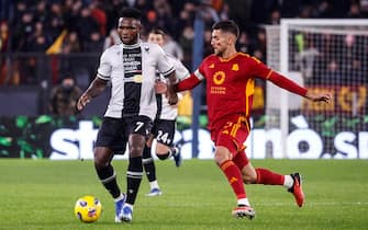 Udinese's Isaac Success (L), AS Roma's Lorenzo Pellegrini during the Italian Serie A soccer match between AS Roma and Udinese at the Olimpico stadium in Rome, Italy, 26 November 2023. ANSA/FABIO FRUSTACI