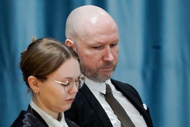 Anders Behring Breivik (R) is seen next to attorney Marte Lindholm during the first day of his trial over his prison conditions, on January 8, 2024 in Tyristrand near Oslo, Norway. Breivik, who killed 77 people in a bombing and shooting rampage in 2011 and who has been held apart from other inmates for 12 years, has sued the state for a second time arguing that his isolation is a violation of the European Convention on Human Rights. (Photo by Cornelius Poppe / NTB / AFP) / Norway OUT (Photo by CORNELIUS POPPE/NTB/AFP via Getty Images)