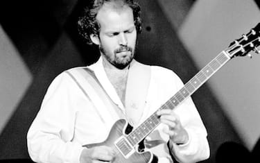 Lasse Wellander, ABBA's touring guitarist performs on stage at the Wembley Arena, London, England, on November 5th, 1979. (Photo by Gus Stewart/Redferns)
