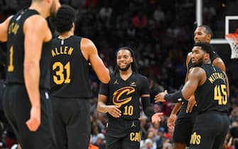 CLEVELAND, OHIO - NOVEMBER 05: Darius Garland #10 celebrates with Jarrett Allen #31 and Donovan Mitchell #45 of the Cleveland Cavaliers after Garland scored at Rocket Mortgage Fieldhouse on November 05, 2023 in Cleveland, Ohio. The Cavaliers defeated the Warriors 115-104. NOTE TO USER: User expressly acknowledges and agrees that, by downloading and or using this photograph, User is consenting to the terms and conditions of the Getty Images License Agreement. (Photo by Jason Miller/Getty Images)