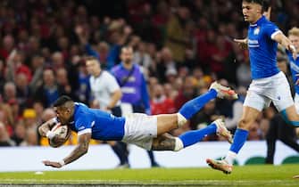 Italy's Monty Ioane scores their first try of the game during the Guinness Six Nations match at the Principality Stadium, Cardiff. Picture date: Saturday March 16, 2024.
