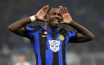 Inter MilanÂ?s Marcus Thuram jubilates  after scoring goal of 3 to 0 during the Italian serie A soccer match between Fc Inter  and Udinese Giuseppe Meazza stadium in Milan, 9  December 2023.
ANSA / MATTEO BAZZI