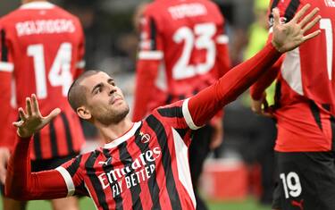 AC Milan’s forward Alvaro Morata celebrates after scoring during the Italian Serie A soccer match between Ac Milan and Lecce at the Giuseppe Meazza stadium in Milan, Italy, 26 September 2024. ANSA/DANIEL DAL ZENNARO