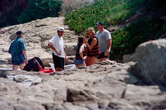 Photo taken on July 14, 1997 shows Britain's Lady Diana spending holidays near the property of her friend Dodi Al-Fayed in Saint Tropez, on the French Riviera. 
Diana, Princess of Wales, and her companion, the Egyptian millionaire film-producer Dodi al-Fayed, died in Paris early 31 August after a midnight car crash. / AFP PHOTO / Patrick HERTZOG        (Photo credit should read PATRICK HERTZOG/AFP via Getty Images)