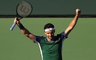 INDIAN WELLS, CALIFORNIA - OCTOBER 13: Grigor Dimitrov of Bulgaria reacts to defeating Danil Medvedev of Russia during their match on Day 10 of the BNP Paribas Open at the Indian Wells Tennis Garden on October 13, 2021 in Indian Wells, California. (Photo by Sean M. Haffey/Getty Images)