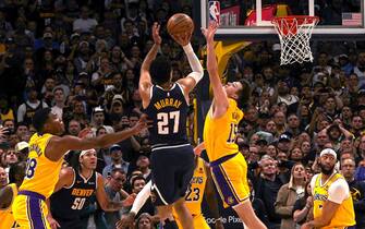 DENVER, CO - APRIL 29: Jamal Murray #27 of the Denver Nuggets makes the game winning shot during the game against the Los Angeles Lakers during Round One Game Five of the 2024 NBA Playoffs on April 29, 2024 at the Ball Arena in Denver, Colorado. NOTE TO USER: User expressly acknowledges and agrees that, by downloading and/or using this Photograph, user is consenting to the terms and conditions of the Getty Images License Agreement. Mandatory Copyright Notice: Copyright 2024 NBAE (Photo by Bart Young/NBAE via Getty Images)