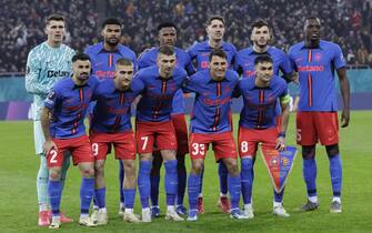 epa11864423 Players of FCSB line up before the UEFA Europa League match between FCSB and Manchester United in Bucharest, Romania, 30 January 2025.  EPA/ROBERT GHEMENT