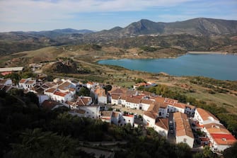 Spain, Andalusia, Municipality Zahara de la Sierra in the province of Cadiz, at the Ruta de los Pueblos Blancos, street to the White Towns of Andalusia, view from the Moorish castle ruins on the place and the reservoir. (Photo by: Bildagentur-online/Universal Images Group via Getty Images)