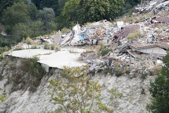 Pescara del Tronto fotografata il 10 agosto 2018 a distanza di due anni dal terremoto del Centro Italia, 14 agosto 2018. ANSA/ CLAUDIO PERI


Pescara del Tronto devastated after the earthquake 24 August 2016 in a picture taken on 10 August 2018. August 24, 2018 marks the second anniversary of the 6.1 magnitude earthquake that devastated central Italy. ANSA/CLAUDIO PERI