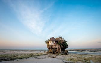 The rock restaurant is a popular restaurant on Zanzibar. Zanzibar is a semi-autonomous part of Tanzania in East Africa. It is composed of the Zanzibar Archipelago in the Indian Ocean, 25â  50 kilometres (16â  31 mi) off the coast of the mainland, and consists of many small islands and two large ones.