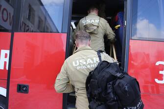 epa10450934 Polish firefighters prepare to depart for a rescue operation after an earthquake in Turkey, at the Rescue and Fire Fighting Unit No. 9 in Lodz, Poland, 06 February 2023. According to the US Geological Service, the earthquake with a preliminary magnitude of 7.8 struck southern Turkey close to the Syrian border. The earthquake caused buildings to collapse and sent shockwaves over northwest Syria, Cyprus, and Lebanon.  EPA/Marian Zubrzycki POLAND POT