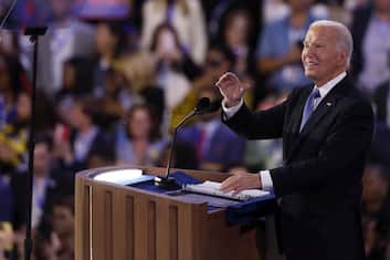 epa11556024 United States President Joe Biden takes the stage during the opening night of the Democratic National Convention (DNC) at the United Center in Chicago, Illinois, USA, 19 August 2024. The 2024 Democratic National Convention is being held from 19 to 22 August 2024, during which delegates of the United States' Democratic Party will vote on the party's platform and ceremonially vote for the party's nominee for president, Vice President Kamala Harris, and for vice president, Governor Tim Walz of Minnesota, for the upcoming presidential election.  EPA/CAROLINE BREHMAN