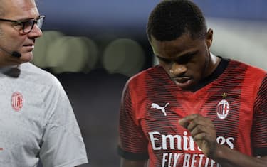 Milanâ&#x80;&#x99;s French defender Pierre Kalulu injured during the Serie A football match between SSC Napoli and AC Milan at the Diego Armando Maradona Stadium in Naples, southern Italy, on October 29, 2023.