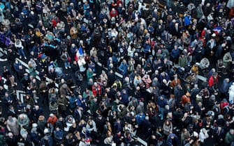 A photograph shows protesters marching against anti-Semitism in a Paris street on November 12, 2023. Tens of thousands are expected to march Sunday in Paris against anti-Semitism amid bickering by political parties over who should take part and a surge in anti-Semitic incidents across France. Tensions have been rising in the French capital, home to large Jewish and Muslim communities, in the wake of the October 7 attack by Palestinian militant group Hamas on Israel, followed by a month of Israeli bombardment of the Gaza Strip. France has recorded nearly 1250anti-Semitic acts since the attack. National Assembly speaker Yael Braun-Pivet and Gerard Larcher, the Senate speaker, called on November 7 for a "general mobilisation" at the march against the upsurge in anti-Semitism. (Photo by Geoffroy VAN DER HASSELT / AFP) (Photo by GEOFFROY VAN DER HASSELT/AFP via Getty Images)