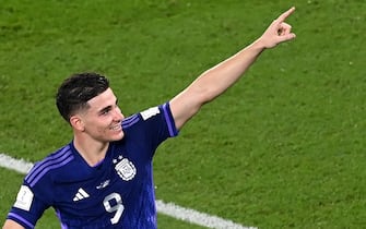 epa10340048 Julian Alvarez of Argentina celebrates after scoring his team's second goal during the FIFA World Cup 2022 group C soccer match between Poland and Argentina at Stadium 947 in Doha, Qatar, 30 November 2022.  EPA/Georgi Licovski