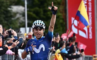 Colombian rider Einer Augusto Rubio of Movistar Team celebrates after crossing the finish line and winning the thirteenth stage of the 2023 Giro d'Italia cycling race over 74,600 km from Le Chable to Crans Montana, Swiss, 19 May 2023. ANSA/LUCA ZENNARO  