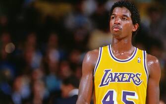 LOS ANGELES, CA - 1988: A.C. Green #45 of the Los Angeles Lakers looks on during a game circa 1988 at The Forum in Los Angeles, California. NOTE TO USER: User expressly acknowledges and agrees that, by downloading and/or using this Photograph, user is consenting to the terms and conditions of the Getty Images License Agreement. Mandatory Copyright Notice: Copyright 1988 NBAE (Photo by Andrew D. Bernstein/NBAE via Getty Images)