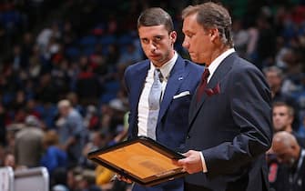 MINNEAPOLIS, MN - NOVEMBER 1:  Flip Saunders and Ryan Saunders of the Minnesota Timberwolves draw up plays during the game against the Chicago Bulls on November 1, 2014 at Target Center in Minneapolis, Minnesota. NOTE TO USER: User expressly acknowledges and agrees that, by downloading and or using this Photograph, user is consenting to the terms and conditions of the Getty Images License Agreement. Mandatory Copyright Notice: Copyright 2014 NBAE (Photo by David Sherman/NBAE via Getty Images)