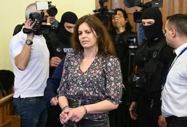 Italian teacher Ilaria Salis arrives in the Hungarian court of Budapest on March 28, 2024 ahead her trial for attacking neo-Nazis. Salis was arrested in Budapest in February 2023 and with three counts of attempted assault and accused of being part of an extreme left-wing organisation following a counter-demonstration against a neo-Nazi rally. (Photo by Attila KISBENEDEK / AFP) (Photo by ATTILA KISBENEDEK/AFP via Getty Images)