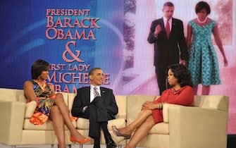 US President Barack Obama and First Lady Michelle Obama chat with talk show host Oprah Winfrey during a taping of the Oprah Winfrey show April 27, 2011 at Harpo Studios in Chicago. AFP PHOTO/Mandel NGAN (Photo credit should read MANDEL NGAN/AFP via Getty Images)