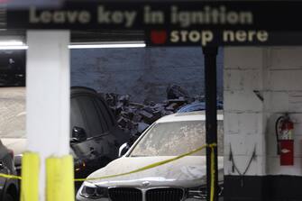 epa10579315 Rubble and dust is seen on vehicles as New York City Fire Department firefighters work to clear the scene of a parking structure collapse in the Financial District of New York City, New York, USA, 18 April 2023. New York City Mayor Eric Adams has reported at least one death and five injured.  EPA/JUSTIN LANE