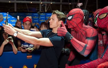 SINGAPORE - JUNE 07:  "Spider-Man: Homecoming star" Tom Holland poses with fans at Marina Bay Sands on June 7, 2017 in Singapore.  (Photo by Ore Huiying/Getty Images for Sony Pictures)