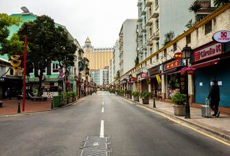 epa08200024 A view at an empty street with shops closed due to the coronavirus outbreak in Macao, China, 07 February 2020.  The coronavirus outbreak is affecting local Portuguese businesses along with their customers in Macao. The novel coronavirus (2019-nCoV), which originated in the Chinese city of Wuhan, has so far killed at least 638 people and infected over 31,000 others, mostly in China.  EPA/CARMO CORREIA