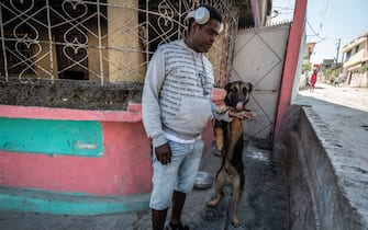 Barbeque with his dog, Barbie in the Delmas 6 Neighborhood