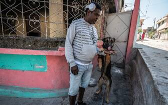 Barbeque with his dog, Barbie in the Delmas 6 Neighborhood