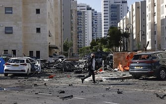 Cars damaged during a rocket attack in Ashqelon, Israel, on Saturday, Oct. 7. 2023. Israel declared a rare state of alert for war on Saturday after militants fired an estimated 2,200 missiles from the Gaza Strip and infiltrated southern parts of the country. Photographer: Kobi Wolf/Bloomberg via Getty Images
