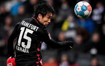 epa09609188 Frankfurt's Daichi Kamada in action during the German Bundesliga soccer match between Eintracht Frankfurt and FC Union Berlin in Frankfurt, Germany, 28 November 2021.  EPA/SASCHA STEINBACH CONDITIONS - ATTENTION: The DFL regulations prohibit any use of photographs as image sequences and/or quasi-video.
