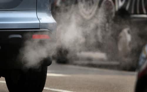 PUTNEY, ENGLAND - JANUARY 10:  Exhaust fumes show on a car in Putney High Street on January 10, 2013 in Putney, England. Local media are reporting local environmental campaigners claims that levels of traffic pollutants mostly nitrogen dioxide have breached upper safe limits in the busy street in south west London.  (Photo by Peter Macdiarmid/Getty Images)