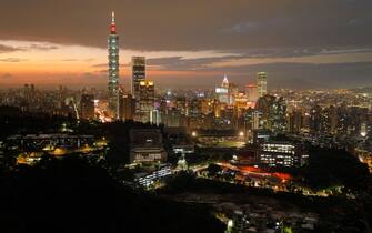 TOPSHOT - This photo taken on November 5, 2018 shows the Taipei skyline at sunset. (Photo by Daniel Shih / AFP)        (Photo credit should read DANIEL SHIH/AFP via Getty Images)