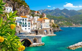 Morning view of Amalfi cityscape on coast line of mediterranean sea, Italy