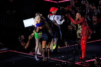 RIO DE JANEIRO, BRAZIL - MAY 04: American singer Madonna hugs Brazilian singer Anitta during a massive free show to close "The Celebration Tour" at Copacabana Beach on May 04, 2024 in Rio de Janeiro, Brazil. (Photo by Buda Mendes/Getty Images)