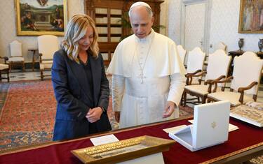 A handout picture provided by the Vatican Media shows Pope Leo XIV (R) meeting the Italian Prime Minister Giorgia Meloni (L) during an audience, in Vatican City, 02 July 2025.   ANSA/VATICAN MEDIA +++ ANSA PROVIDES ACCESS TO THIS HANDOUT PHOTO TO BE USED SOLELY TO ILLUSTRATE NEWS REPORTING OR COMMENTARY ON THE FACTS OR EVENTS DEPICTED IN THIS IMAGE; NO ARCHIVING; NO LICENSING +++ NPK