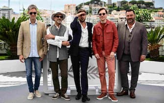 Swedish film director and President of the Jury of the 76th Cannes Film Festival Ruben Ostlund (C) poses with members of the jury (from L) Argentinian film director Damian Szifron, French-Afghan writer and film director Atiq Rahimi, US actor Paul Dano and French actor Denis Menochet during a photocall for the 2023 Cannes film festival jury at the 76th edition of the Cannes Film Festival in Cannes, southern France, on May 16, 2023. (Photo by CHRISTOPHE SIMON / AFP) (Photo by CHRISTOPHE SIMON/AFP via Getty Images)