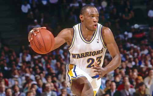 OAKLAND, CA - 1988: Mitch Richmond #23 handles the ball circa 1988 at the Oakland-Alameda County Coliseum Arena in Oakland, California. NOTE TO USER: User expressly acknowledges and agrees that, by downloading and/or using this photograph, user is consenting to the terms and conditions of the Getty Images License Agreement. Mandatory Copyright Notice: Copyright 1988 NBAE (Photo by Andrew D. Bernstein/NBAE via Getty Images)