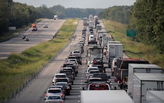 JOHNSTON, IL - AUGUST 21:  Traffic is backed up in the northbound lanes of Interstate 57 following the solar eclipse on August 21, 2017 near Johnston, Illinois. With approximately 2 minutes 40 seconds of totality the area in Southern Illinois experienced the longest duration of totality during the eclipse. Millions of people watched the eclipse as it cut a path of totality 70 miles wide across the United States from Oregon to South Carolina on August 21.  (Photo by Scott Olson/Getty Images)