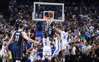 DALLAS, TX - MAY 11: Kyrie Irving #11 of the Dallas Mavericks shoots the ball during the game against the Oklahoma City Thunder during Round 2 Game 3 of the 2024 NBA Playoffs on May 11, 2024 at the American Airlines Center in Dallas, Texas. NOTE TO USER: User expressly acknowledges and agrees that, by downloading and or using this photograph, User is consenting to the terms and conditions of the Getty Images License Agreement. Mandatory Copyright Notice: Copyright 2024 NBAE (Photo by Logan Riely/NBAE via Getty Images)