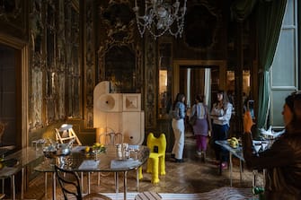 MILAN, ITALY - APRIL 15: People visit the exhibition "L'Appartamento" by Artemest, located at Residenza Vignale, during the Milan Design Week 2024 on April 15, 2024 in Milan, Italy. Every year, the Salone Internazionale del Mobile and Fuorisalone define the Milan Design Week, the worldâ  s largest annual furniture and design event. Centered on principles of circular economy, reuse, and sustainable practices and materials, the Fuorisaloneâ  s 24 theme:Â â  Materia Naturaâ  , seeks to foster a culture of mindful design. (Photo by Emanuele Cremaschi/Getty Images)
