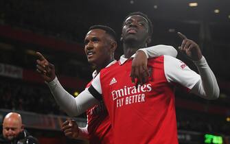 epa10227864 Eddie Nketiah (R) of Arsenal celebrates with teammate Marquinhos after scoring the opening goal during the UEFA Europa League group A soccer match between Arsenal London and Bodo Glimt in London, Britain, 06 October 2022.  EPA/NEIL HALL
