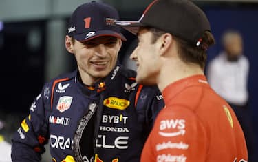 BAHRAIN INTERNATIONAL CIRCUIT, BAHRAIN - MARCH 04: Pole man Max Verstappen, Red Bull Racing, and Charles Leclerc, Scuderia Ferrari, after Qualifying during the Bahrain GP at Bahrain International Circuit on Saturday March 04, 2023 in Sakhir, Bahrain. (Photo by Sam Bloxham / LAT Images)